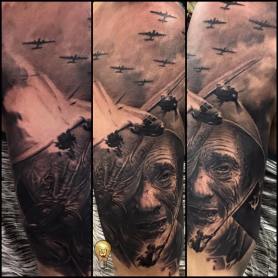 Black And Grey World War Sleeve Tattoo