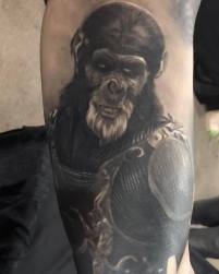 Black And Grey Ape Tattoo