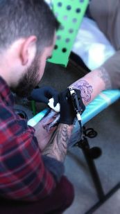 Black and Grey Statue Tattoo