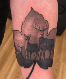 Black and Grey Realistic Deer Scene Tattoo