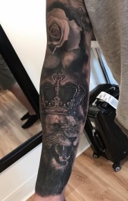 Black and Grey Lion King Portrait with Rose Photo Realistic Tattoo Sleeve