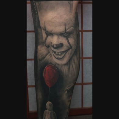 Black and Grey with Red Accent Realism Pennywise Tattoo Sleeve