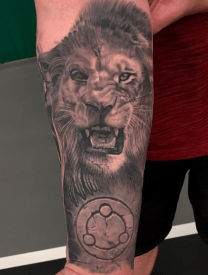 Black and Grey Lion Portrait Tattoo