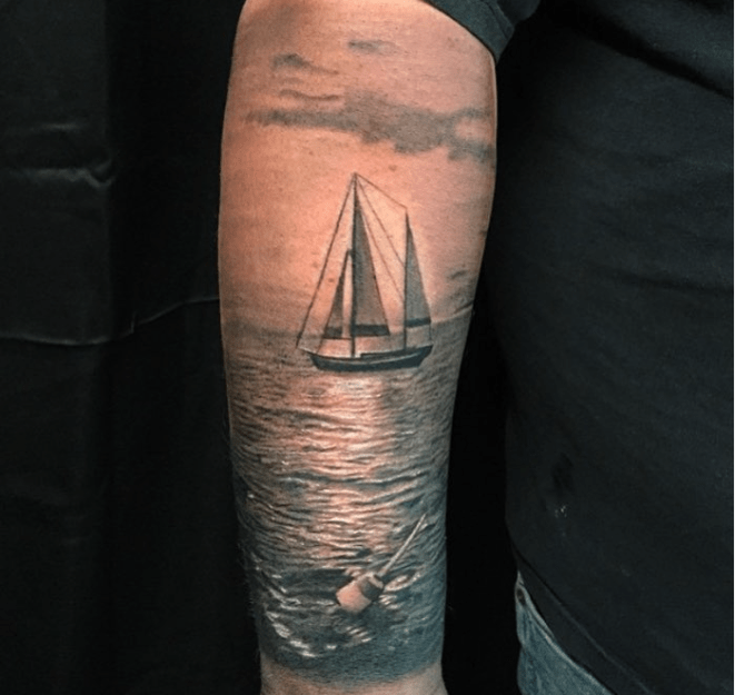 Black and Grey Sailboat on Water Tattoo