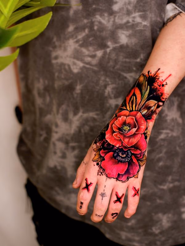 Watercolor Rose Hand Tattoo