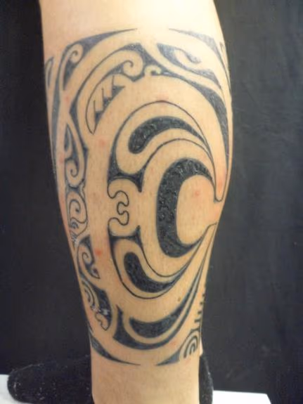 Polynesian on leg side 1