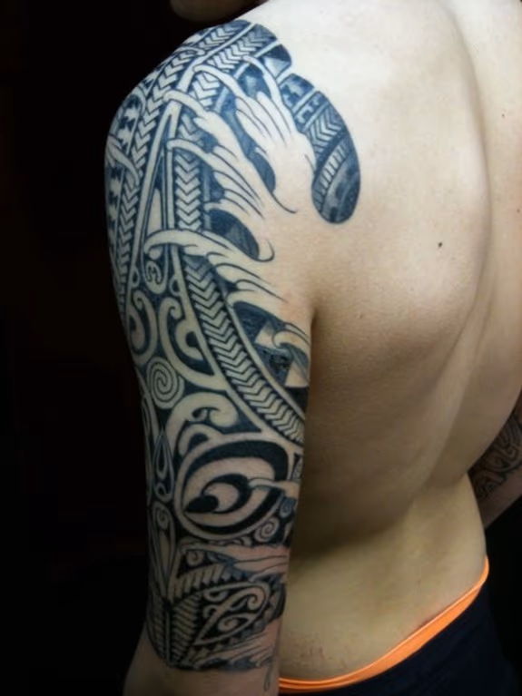 Polynesian arm with waves