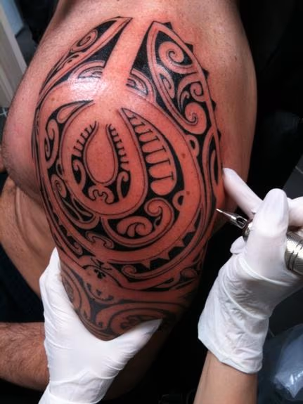Polynesian on shoulder