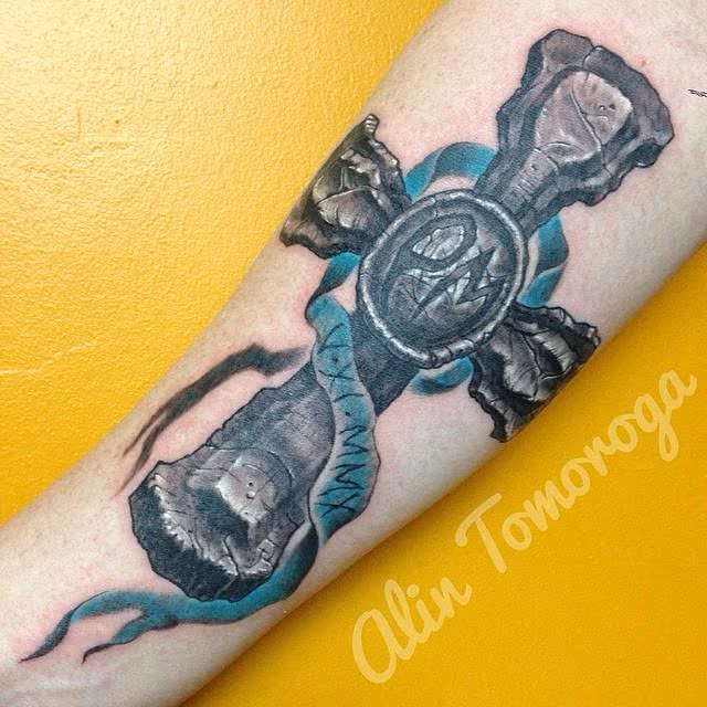 Memorial Rock Sculpted Cross with Teal Ribbon