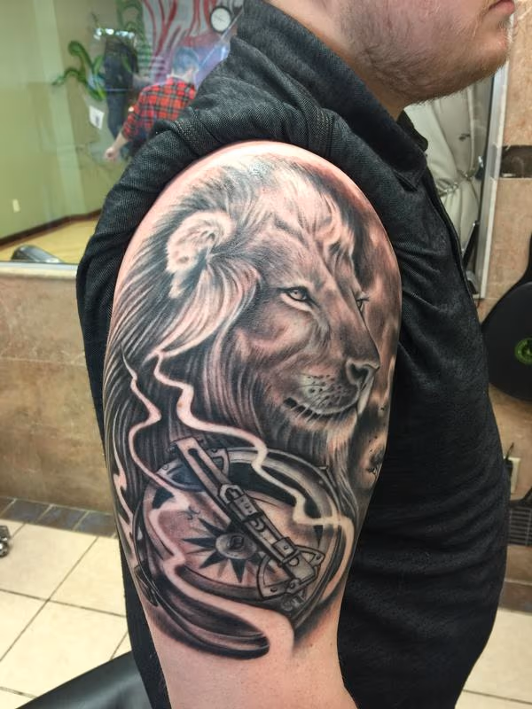 Lion/Compass Tattoo