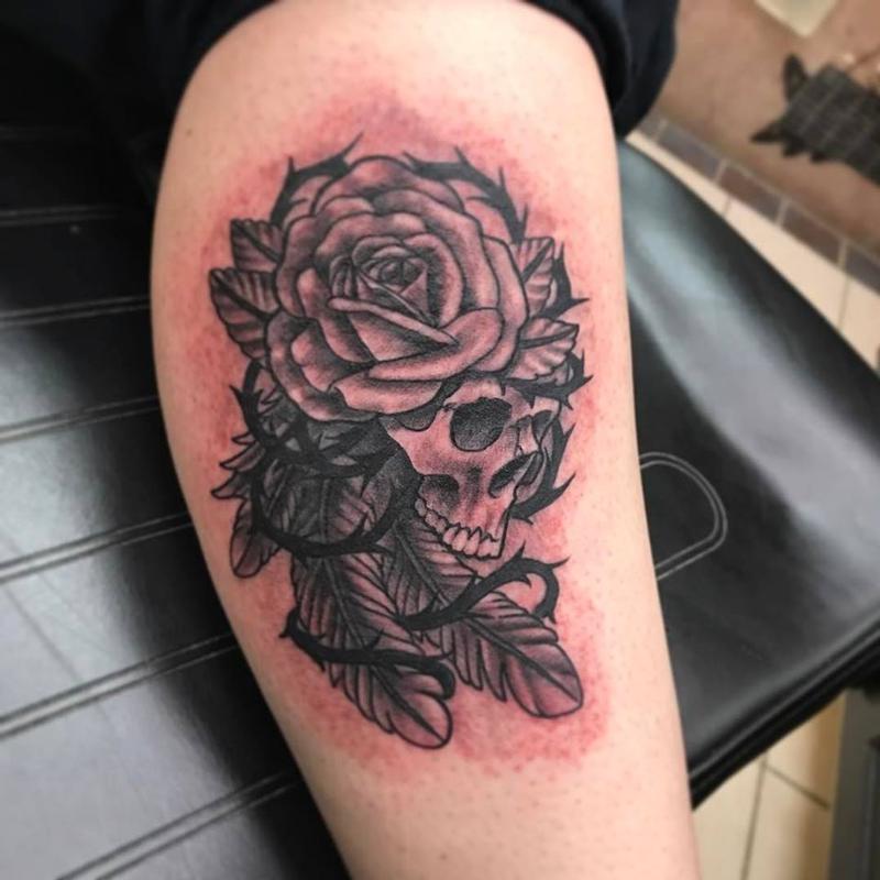 Skull/ rose/ feathers