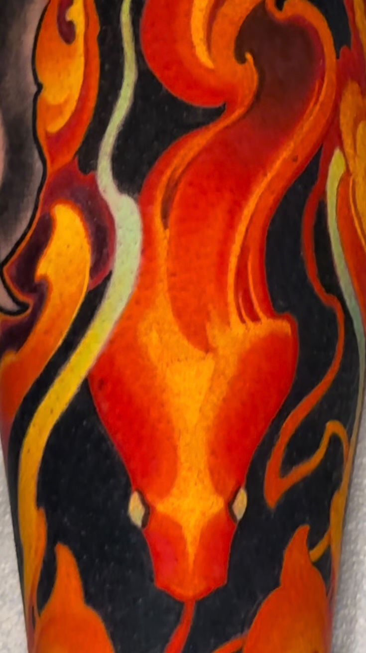 Foo dog with flame snakes leg sleeve in color