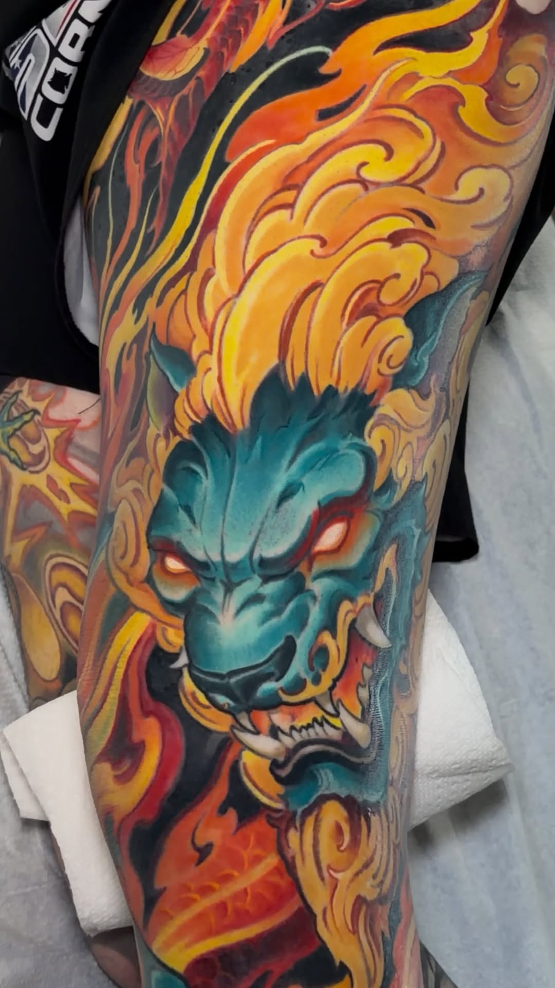 Color demon skull with flaming ornamental sleeve
