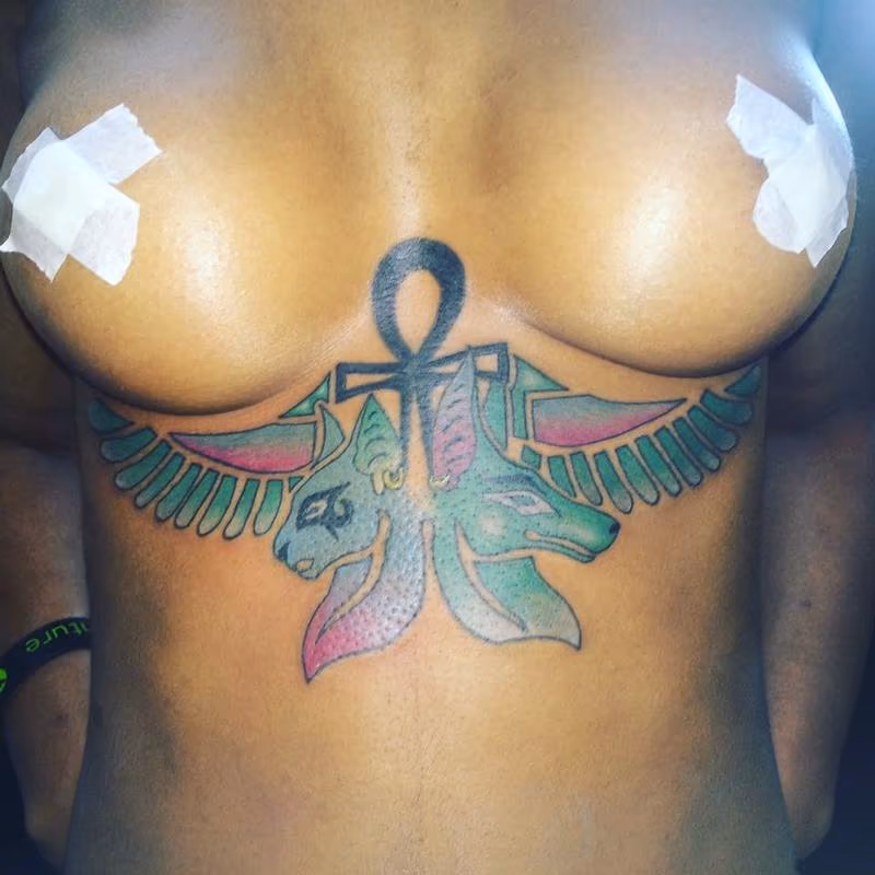 Egyptian under bust tattoo