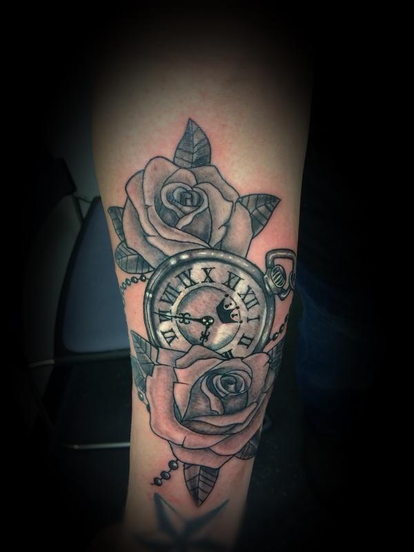 Clock and roses