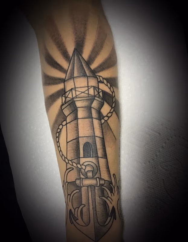 Lighthouse,waves, anchor, and rays
