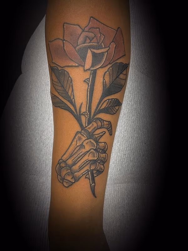 Skeleton Hand with Rose Tattoo