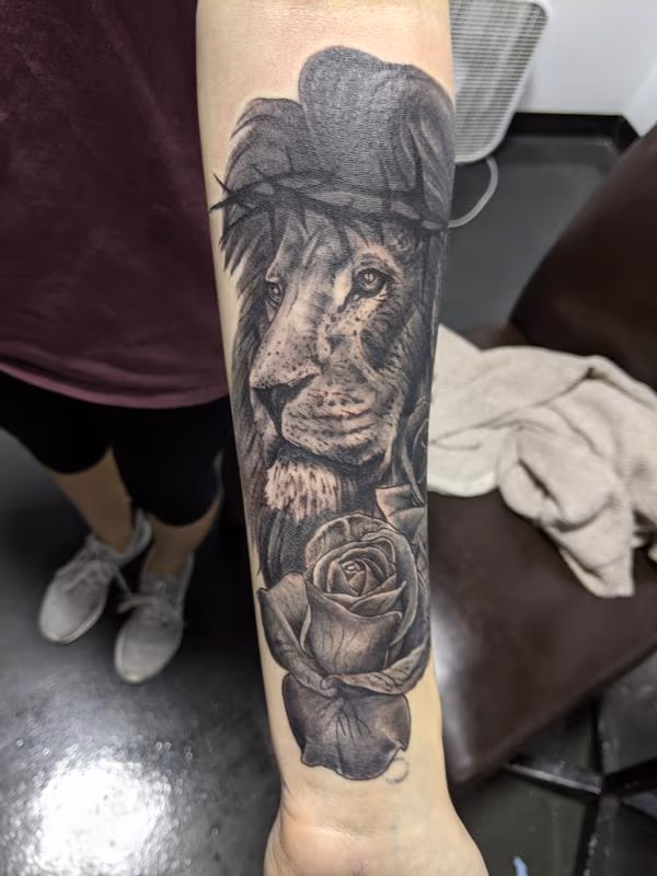Lion and roses