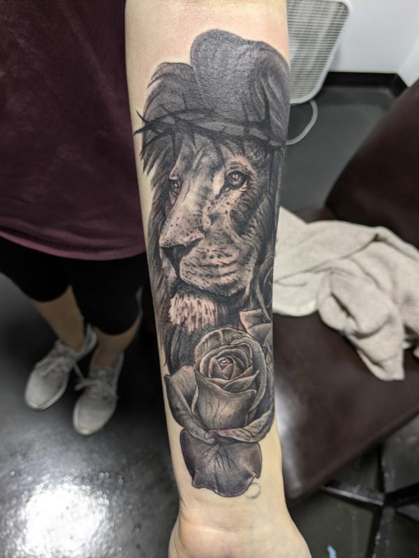 Lion and roses
