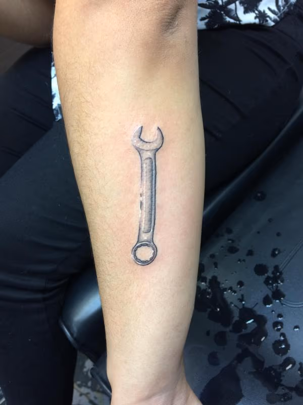Black and grey wrench