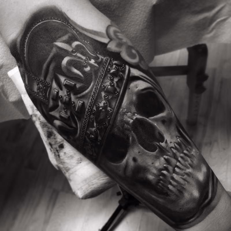 Realistic black and gray skull with crown, Brent Olson Art Junkies Tattoo
