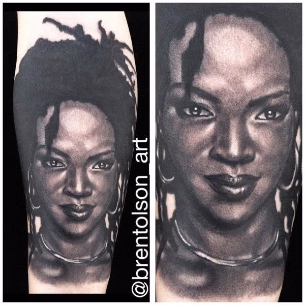 black and gray realitic portrait of Lauryn Hill tattoo. Brent Olson Art Junkies Tattoo