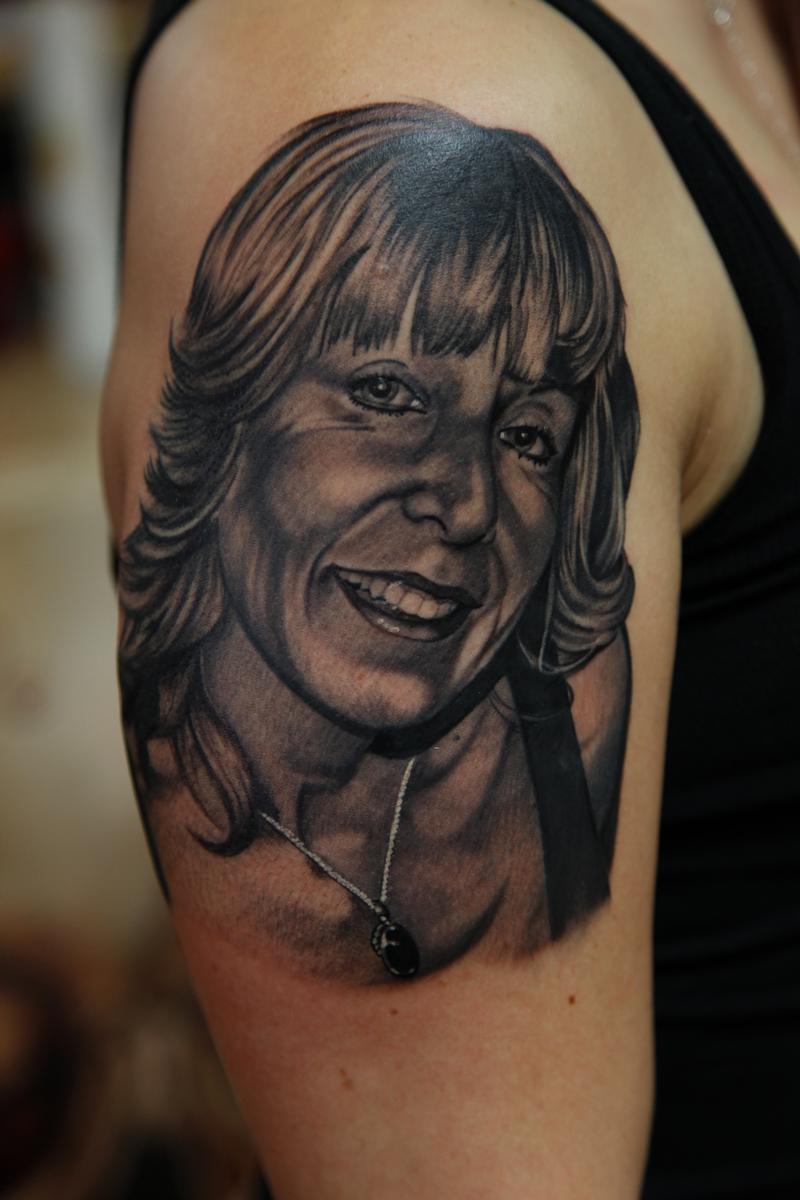 Black and Grey realistic portrait tattoo