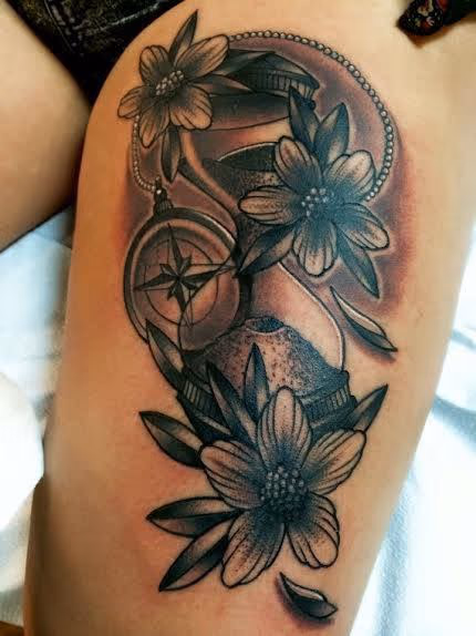 Black and Gray traditional compass with flowers tattoo. Frichard Adams Art Junkies Tattoo