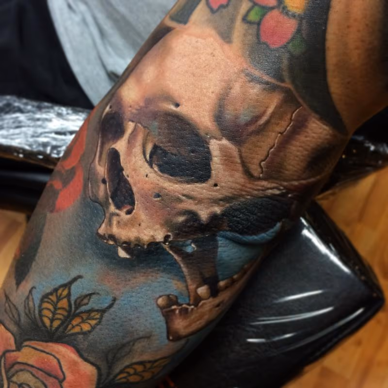 Realistic color skull tattoo, Brent Olson Art Junkies Tattoo