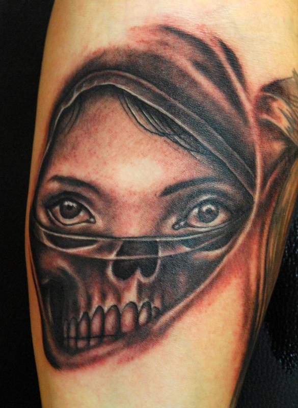 Woman and Skull Tattoo