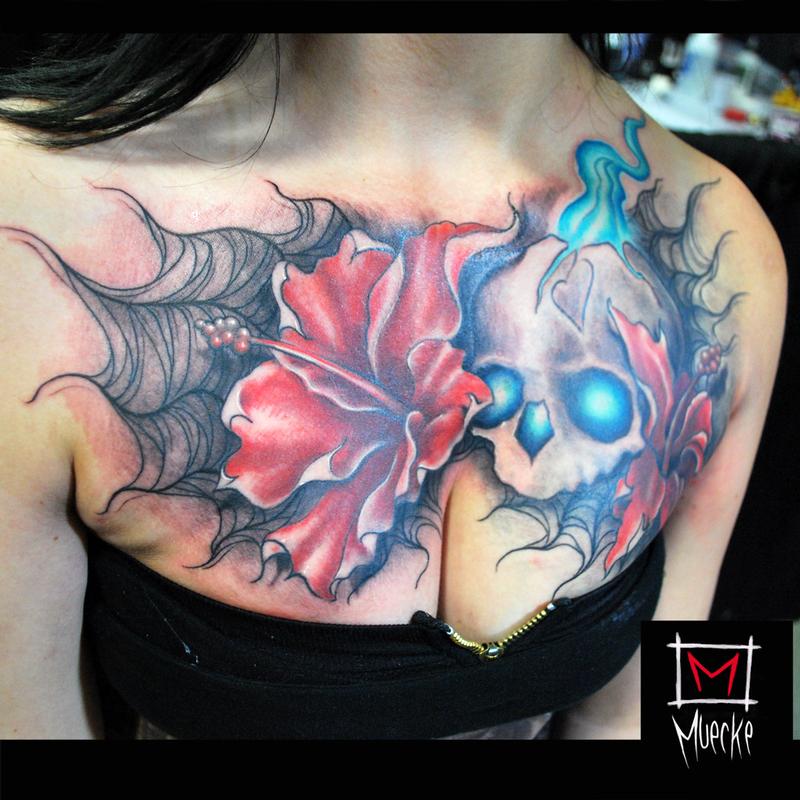 Muecke Chest piece tattoo skull spiderweb rose flowers girl ink