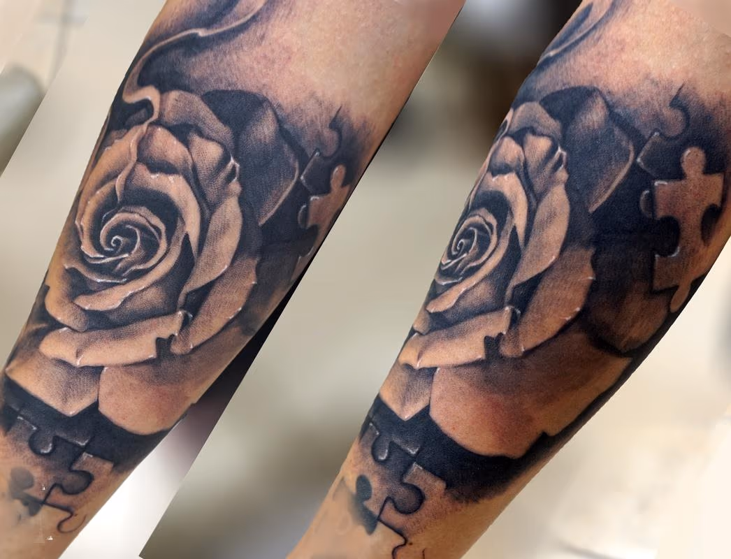 rose puzzle piece tattoo girl tatts
