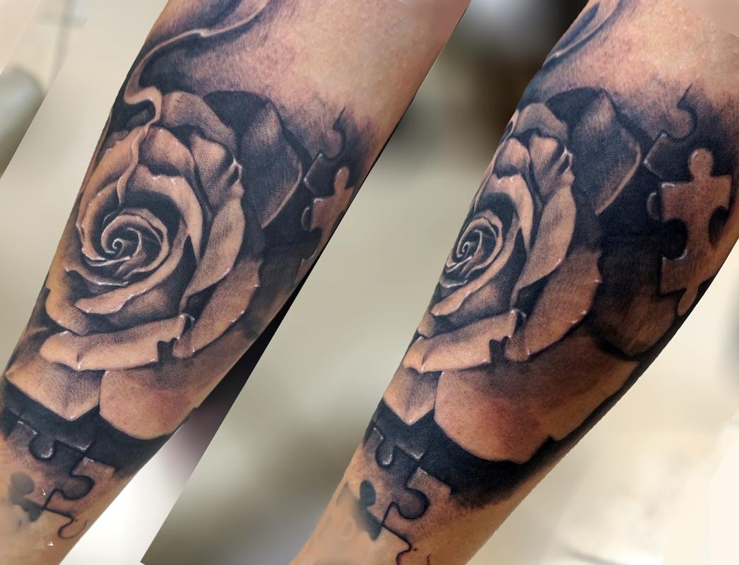 rose puzzle piece tattoo girl tatts