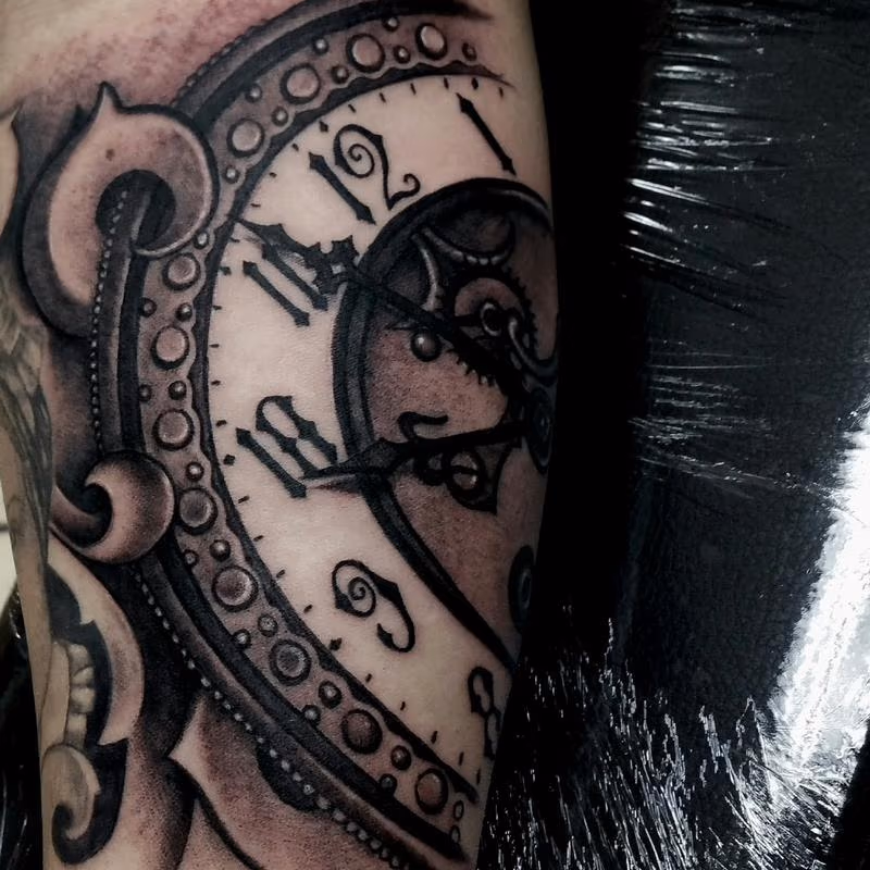 clock time piece tattoo