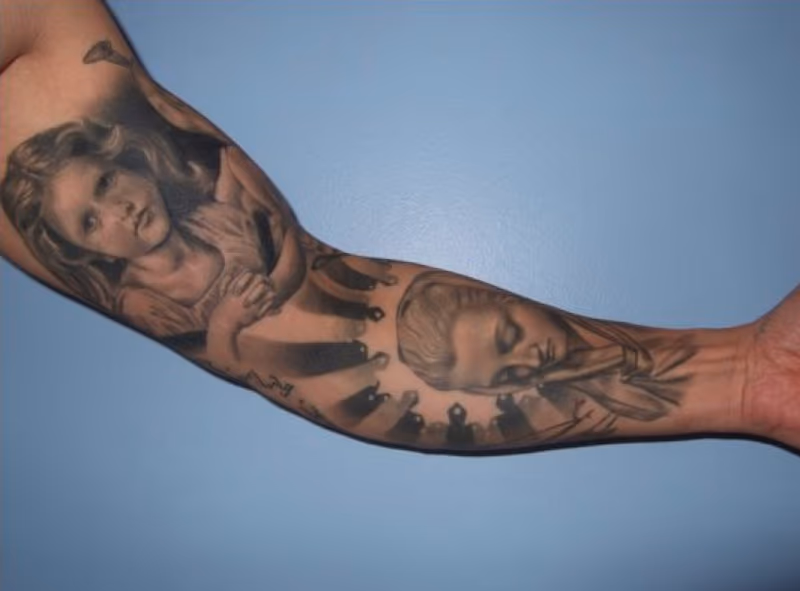 Ray's black and grey religious sleeve