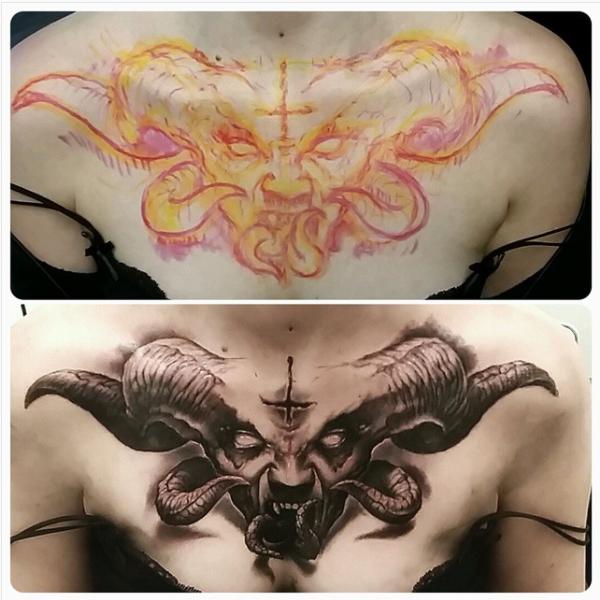horned demon chest tattoo