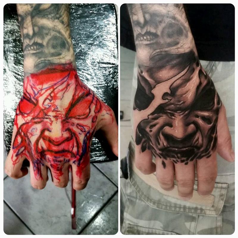 evil face on hand
