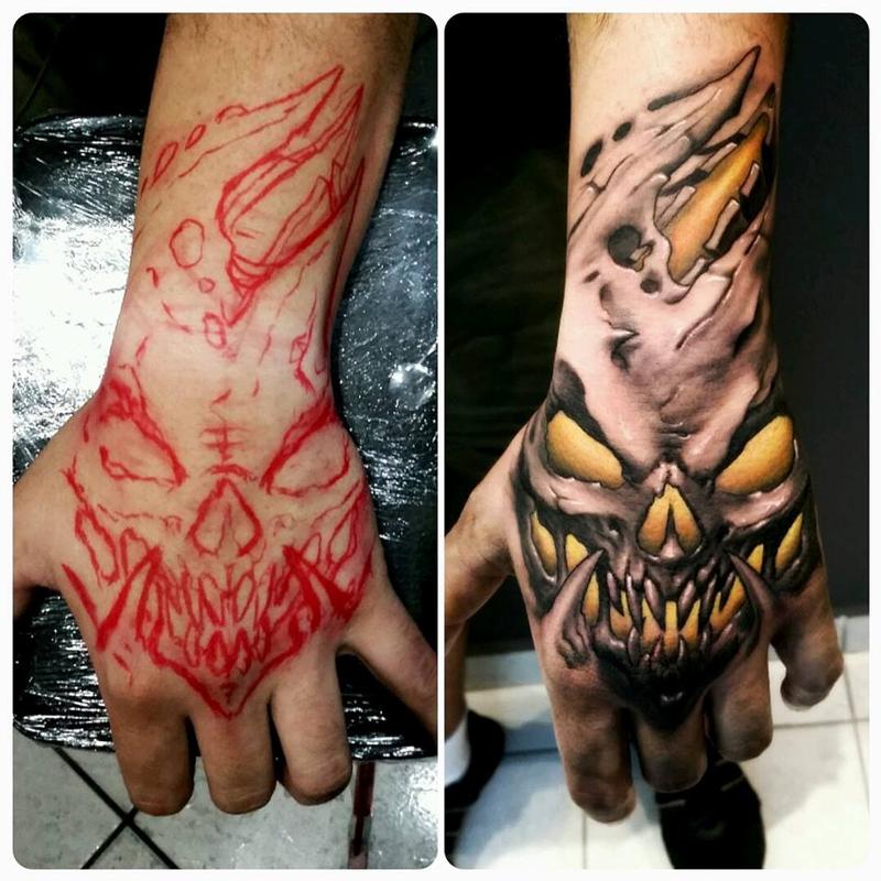 yellow b&g hand tattoo
