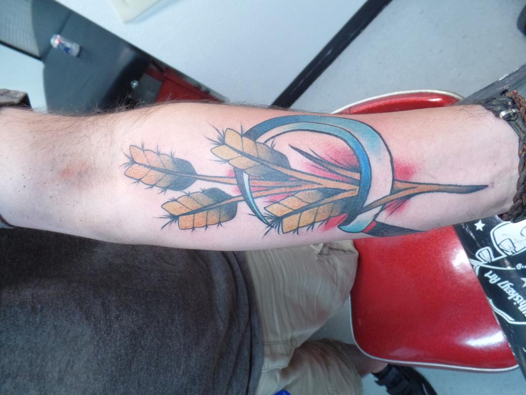 sickle and wheat