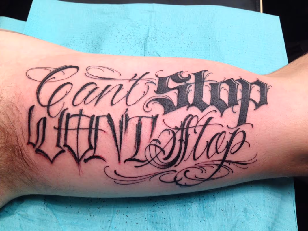 "Can't Stop Won't Stop" Script Tattoo
