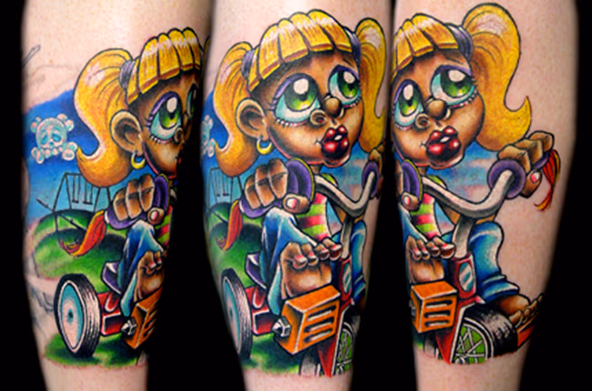 little girl on trycicle and playground tattoo