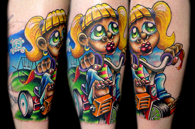 little girl on trycicle and playground tattoo