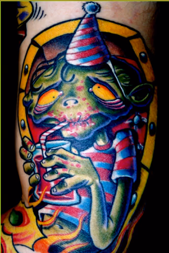 blood drinkin party zombie in a coffin tattoo
