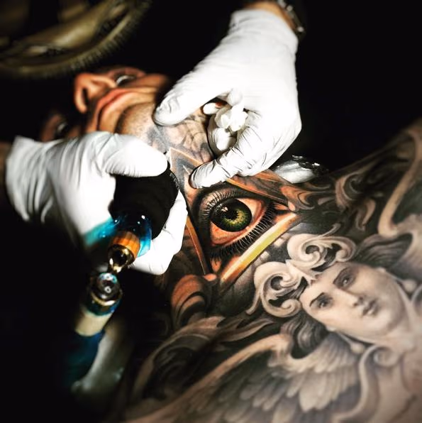 Eye throat tattoo