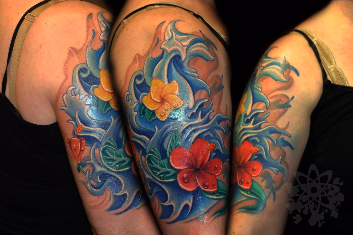 water and hibiscus and plumeria flowers