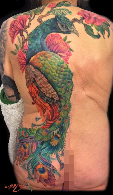 Peacock half back to front upper thigh