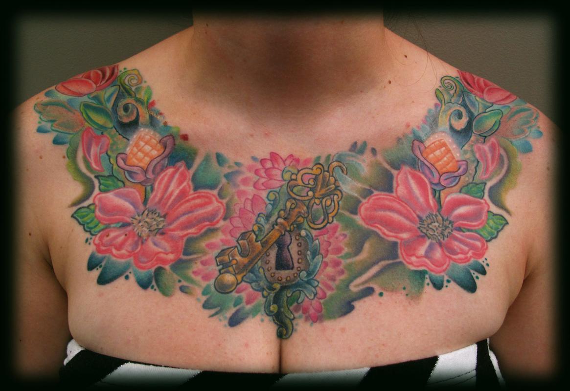 Cady's Chest Piece, I tattooed Cady a few years ago with the cherry blossoms on the sides. Over the last few weeks we had 3 sessions to make what we started with a full chest piece, i am really happy with the out come. Shes a great sitter. Thanks for letting me doddle ;)