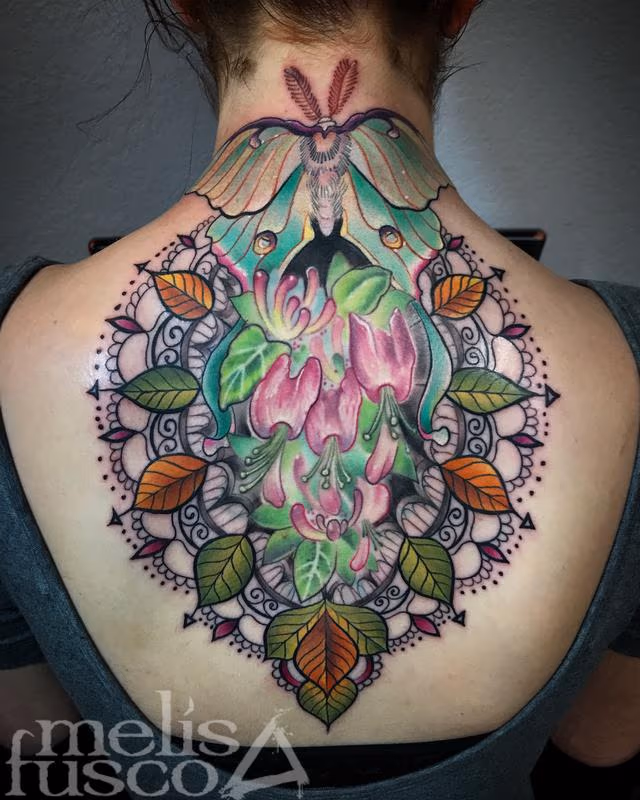 Luna moth and ornate design