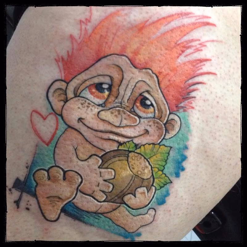 baby ginger troll with a nut