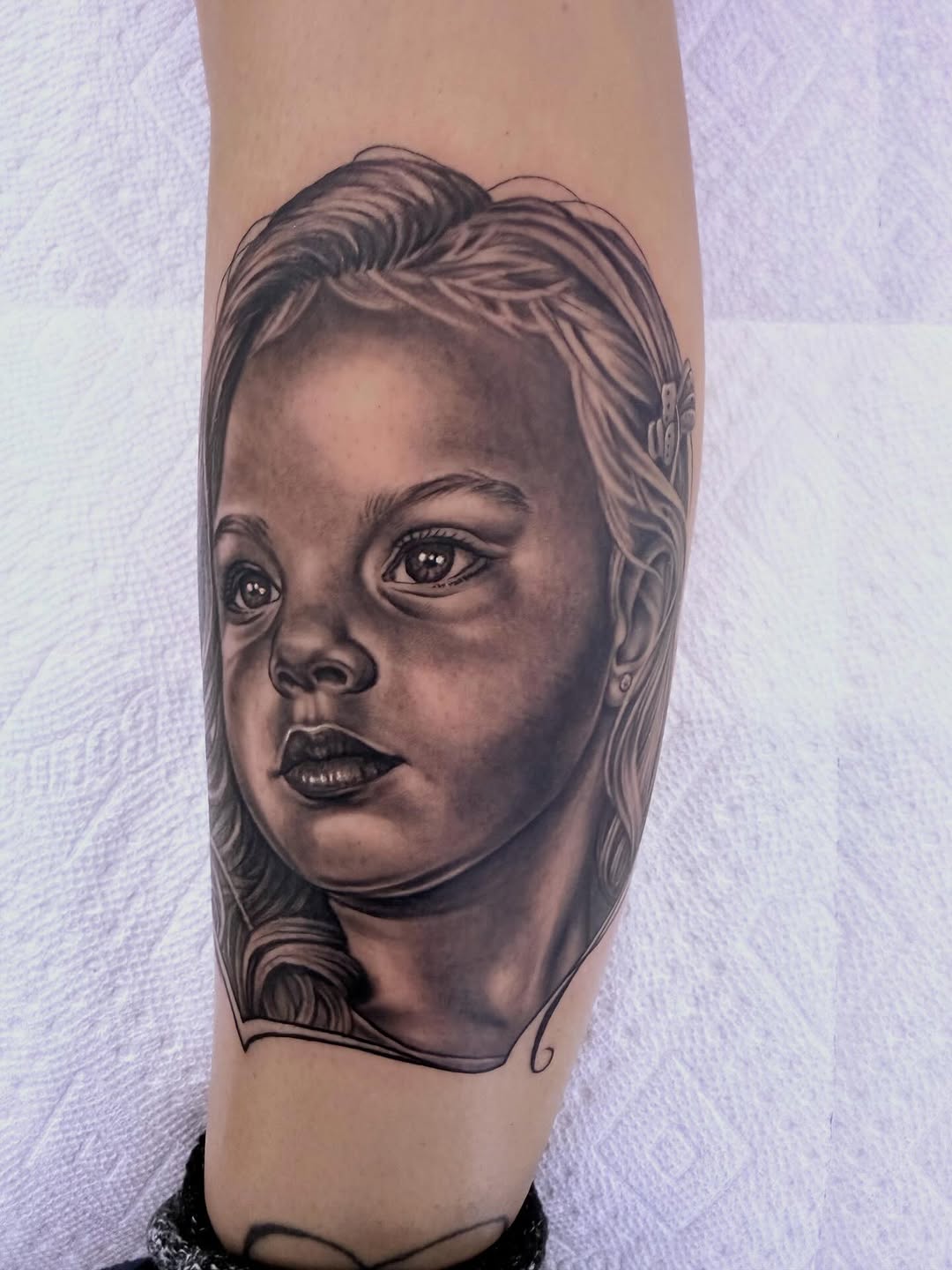 Black-and-grey portrait of girl, calf